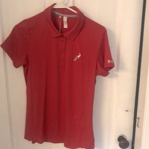 Under Armour red golf polo with stitched silver & white peacock on left chest.